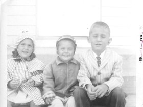 1964 Summer (taken) Zann, Paul, John on front stoop.jpg